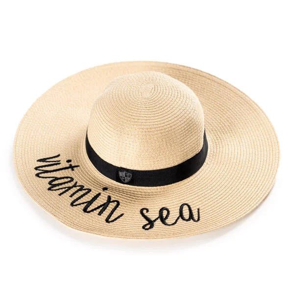 Lightweight straw beach hat for women with a simple design for sun protection -Floppy Straw Hat | Vitamin Sea