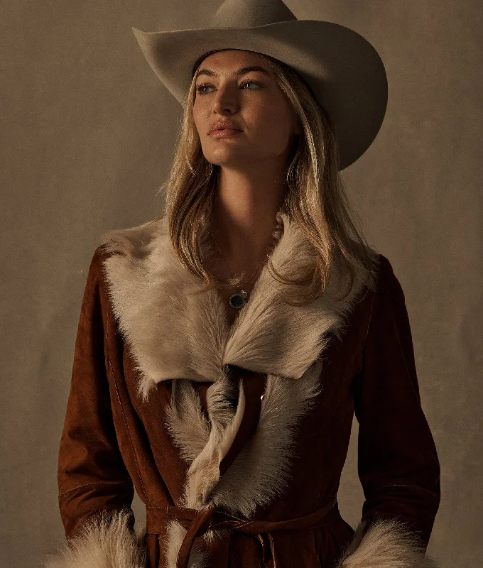 Authentic cowboy hats with feather accents for a bold and distinctive look -The Alamo :: Stone